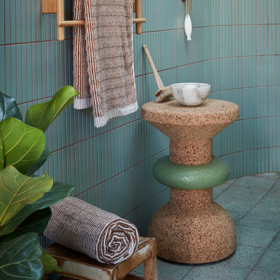 Tall African cork side table.jpg