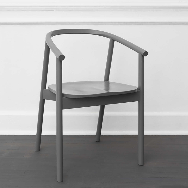 HARDWOOD CHAIR BY JAMES MUDGE. The Hardwood Chair is a striking but comfortable contemporary dining chair design. The elegant scoop of the backrest and the shaped timber seat are offset by the crisp lines of the angled timber legs.