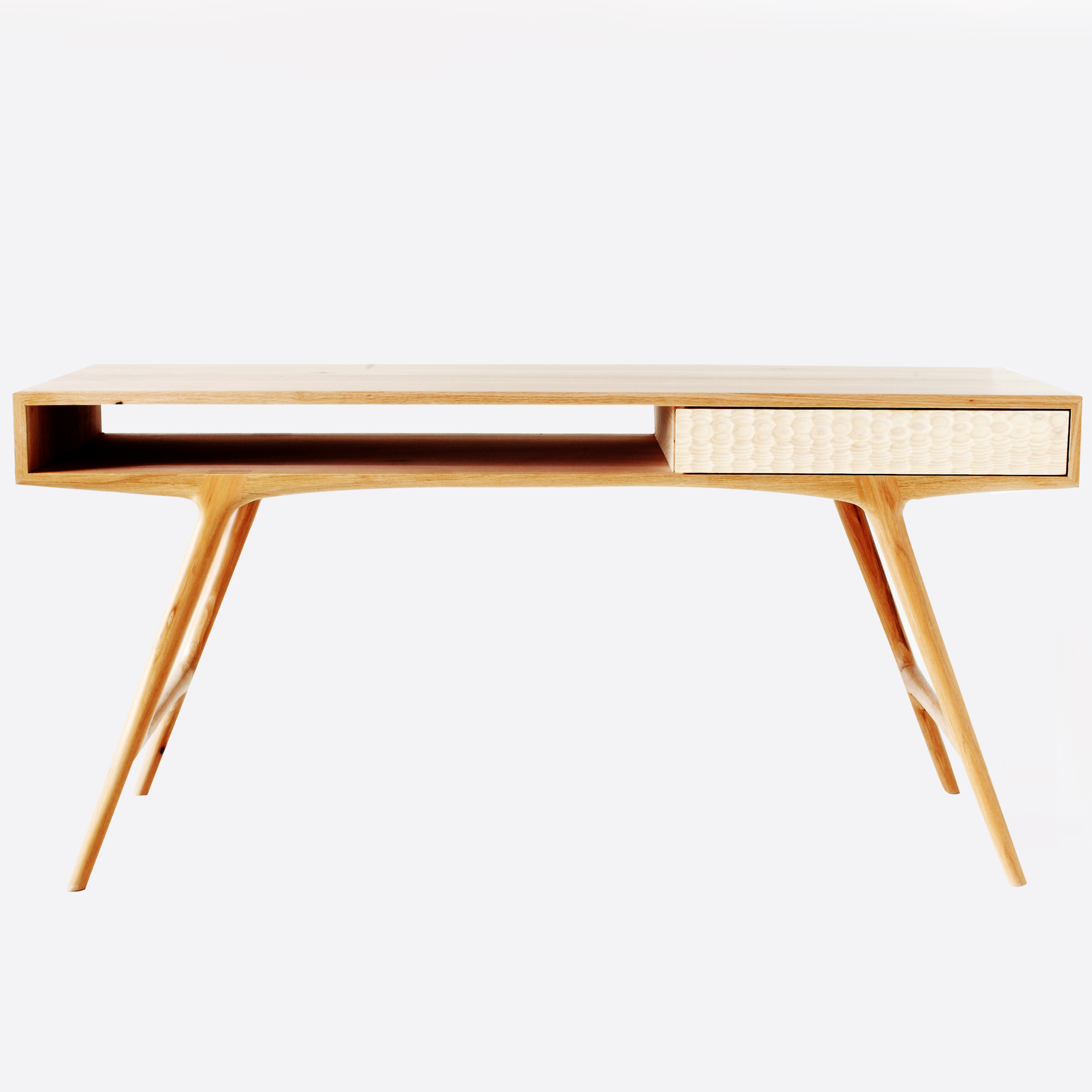 Blacktail Desk by Meyer Von Wielligh Furniture Design. Inspired by South Africa’s national fish, the blacktailor galjoen, this desk is defined by a scale-like pattern that is hand ground onto the wooden surface of the doors.