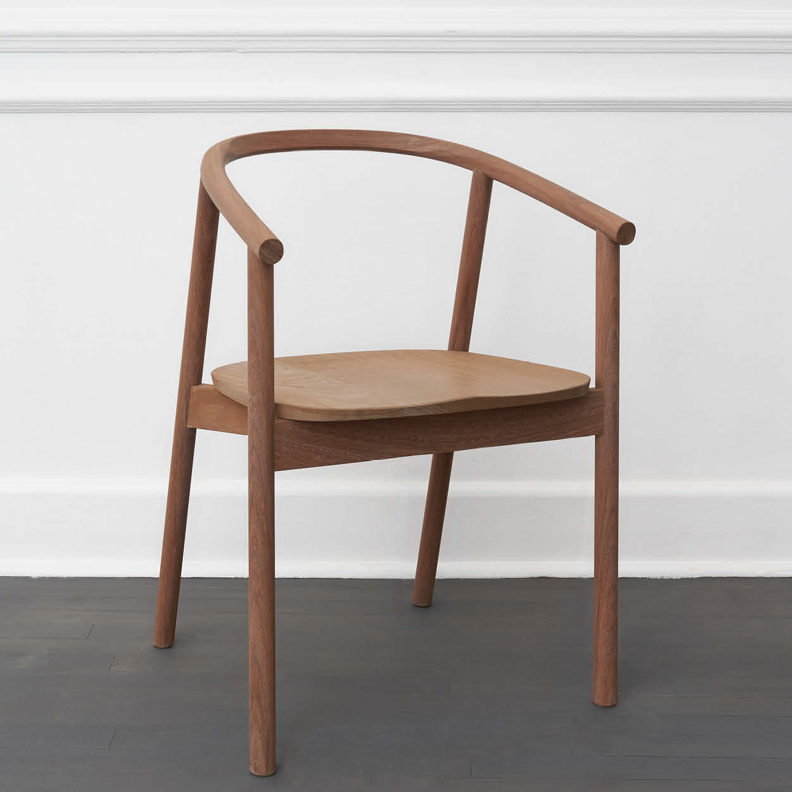 HARDWOOD CHAIR BY JAMES MUDGE. The Hardwood Chair is a striking but comfortable contemporary dining chair design. The elegant scoop of the backrest and the shaped timber seat are offset by the crisp lines of the angled timber legs.