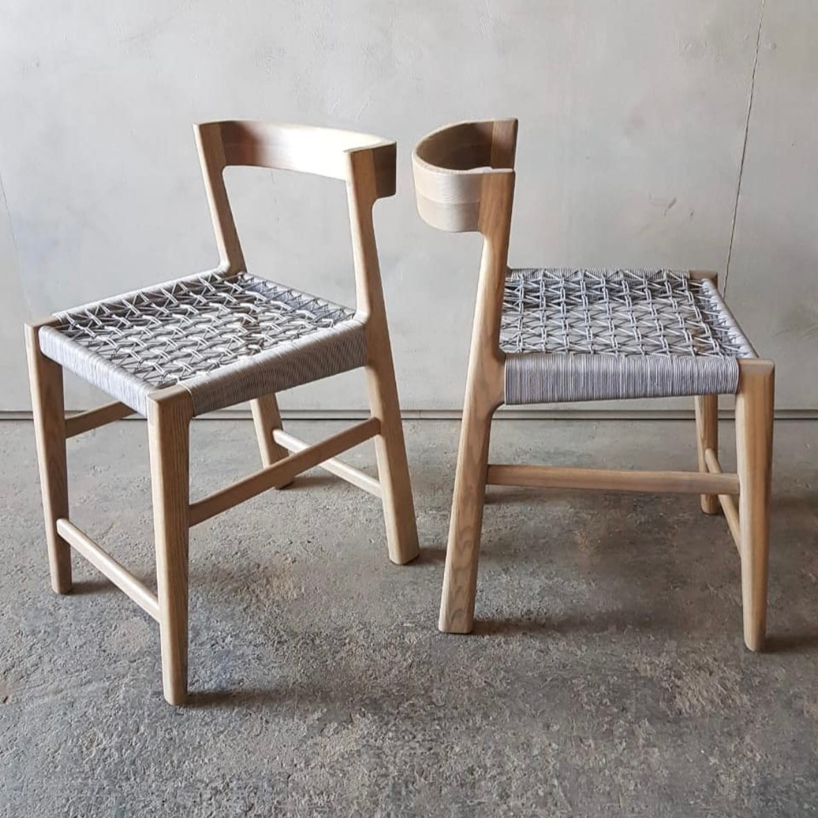 The Odi Barstool by Vogel Furniture Design. Made from a selection of timbers and finishes, it features a comfy woven base, in an assortment of patterns, weaves and colors.