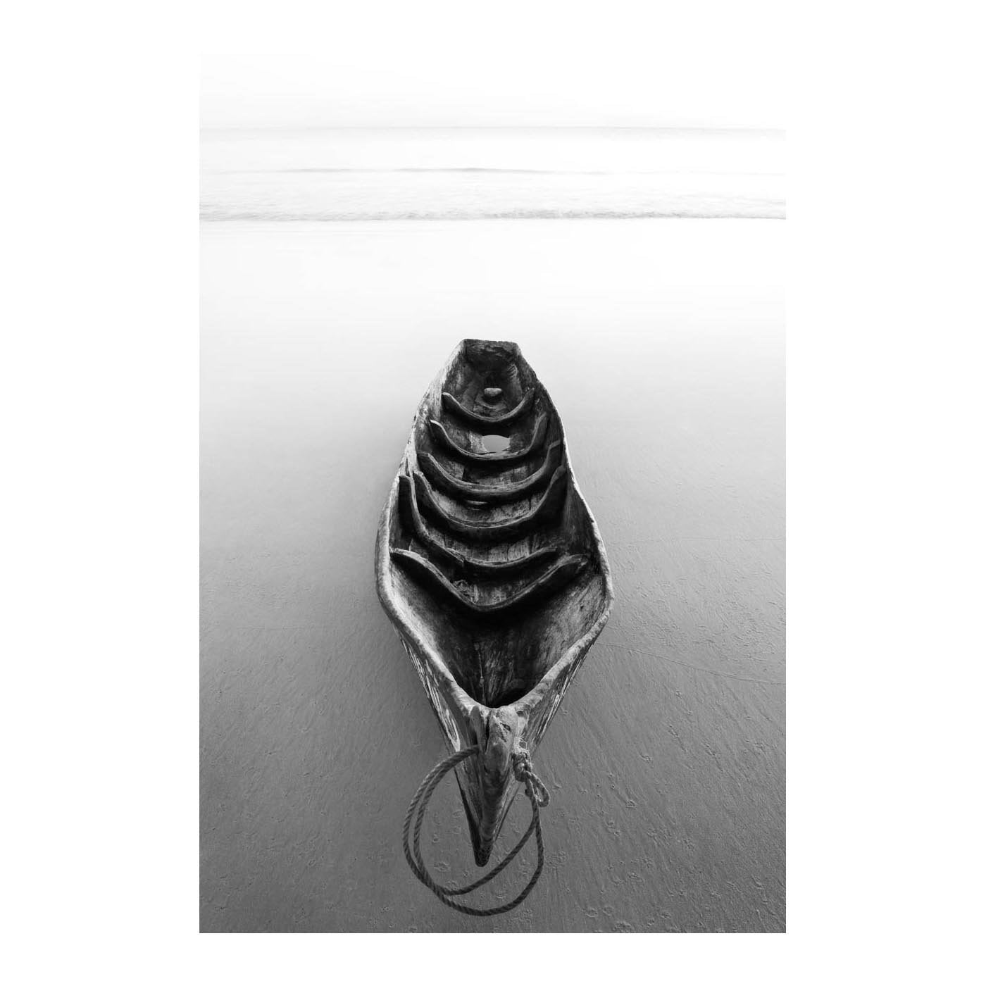 ILHA_23 BY DAVID BALLAM. Dugout, Chocas Mar, Moçambique. This artwork is from Ilha Collection by South African fine arts photographer David Ballam. It features a beautiful seascape view of fishermen at work.