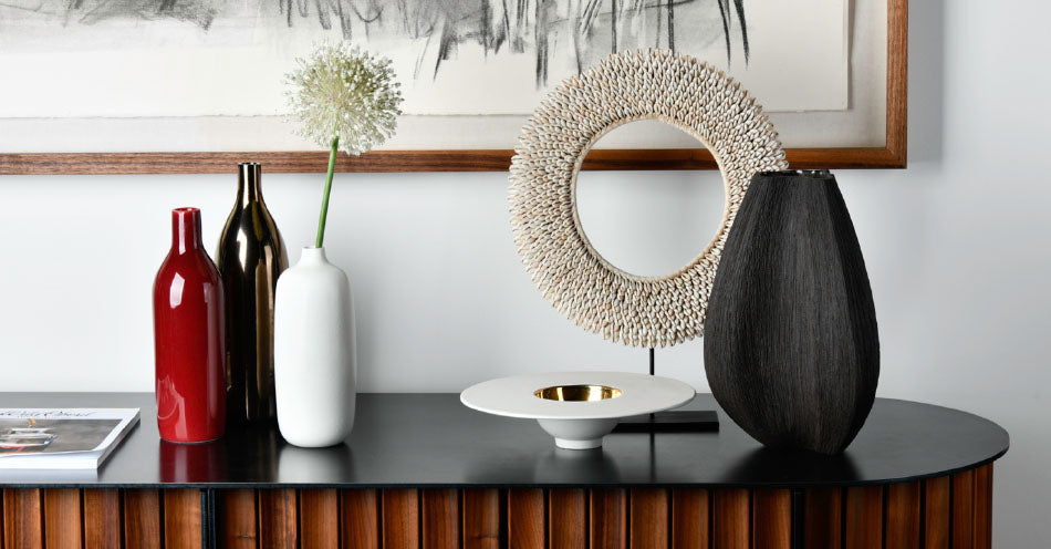 Vorster & Braye bowls and vases styled on a sideboard. Vorster & Braye ceramics are available at Sarza home goods, furniture & décor store in Rye