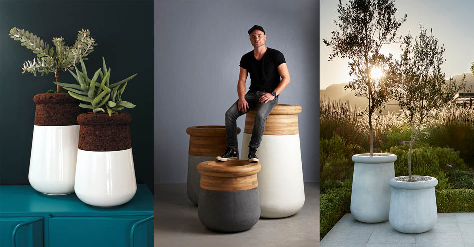 Indigenus planter designer, Laurie Wiid van Heerden, sitting alongside his planter designs. The planters are available at Sarza home goods, furniture & décor store in Rye