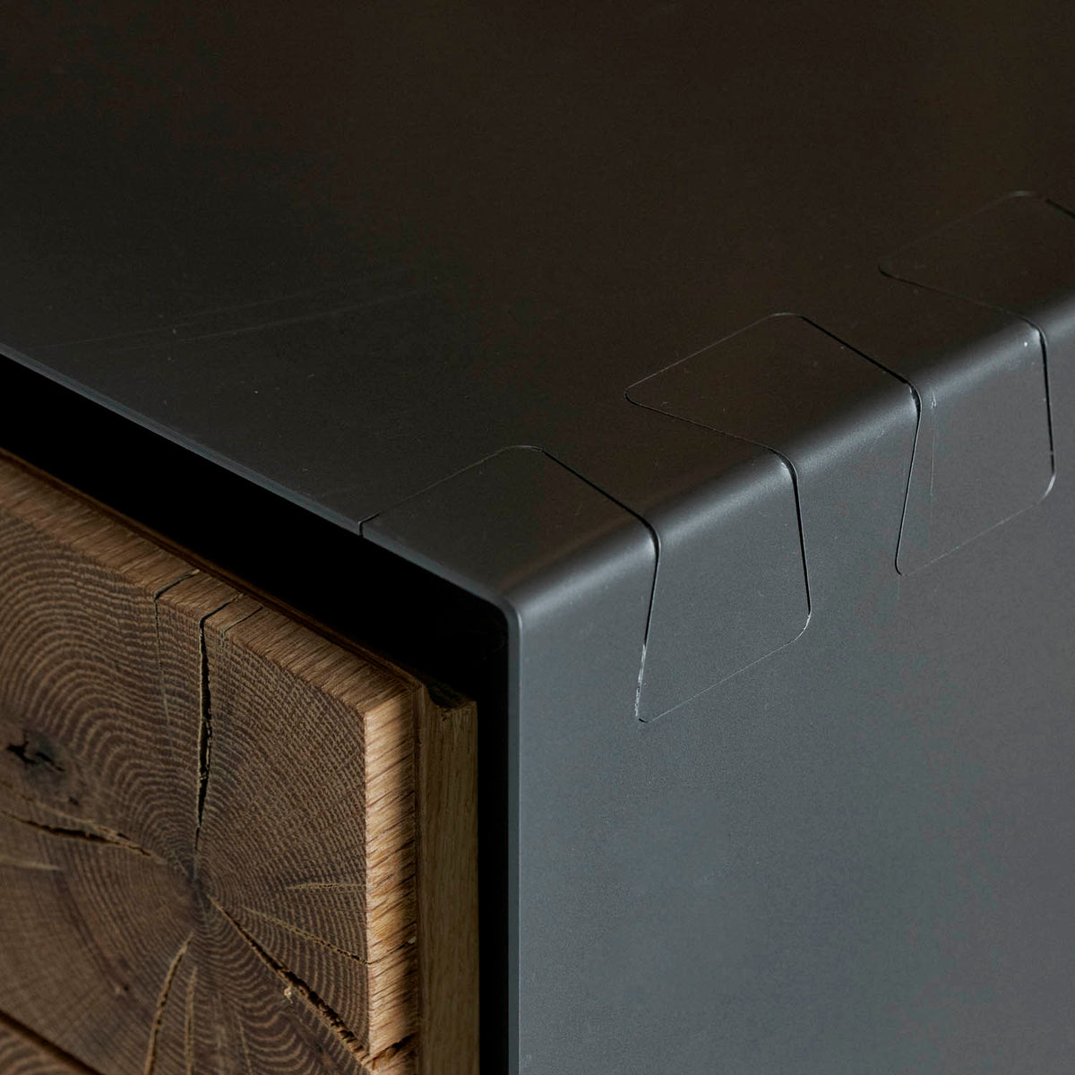 Instomi Metal Side Board by Meyer Von Wielligh. This beautiful Side Board celebrates the uniqueness of timber and tells the story of the tree from which it is made. Using a repeat pattern of the pith of the tree with a timber or metal surround, this design reveals the lifeblood of the tree while the end grain allows us to calculate the age. 