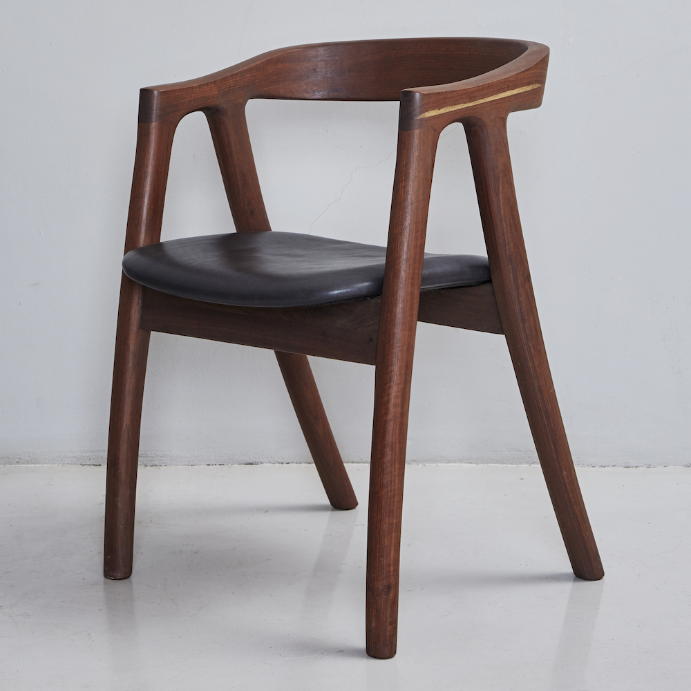 Umthi Dining Chair by Meyer Von Wielligh. The design allows the wood to dictate its natural form. The Umthi Dining Chair is inspired by the organic lines of tree branches.