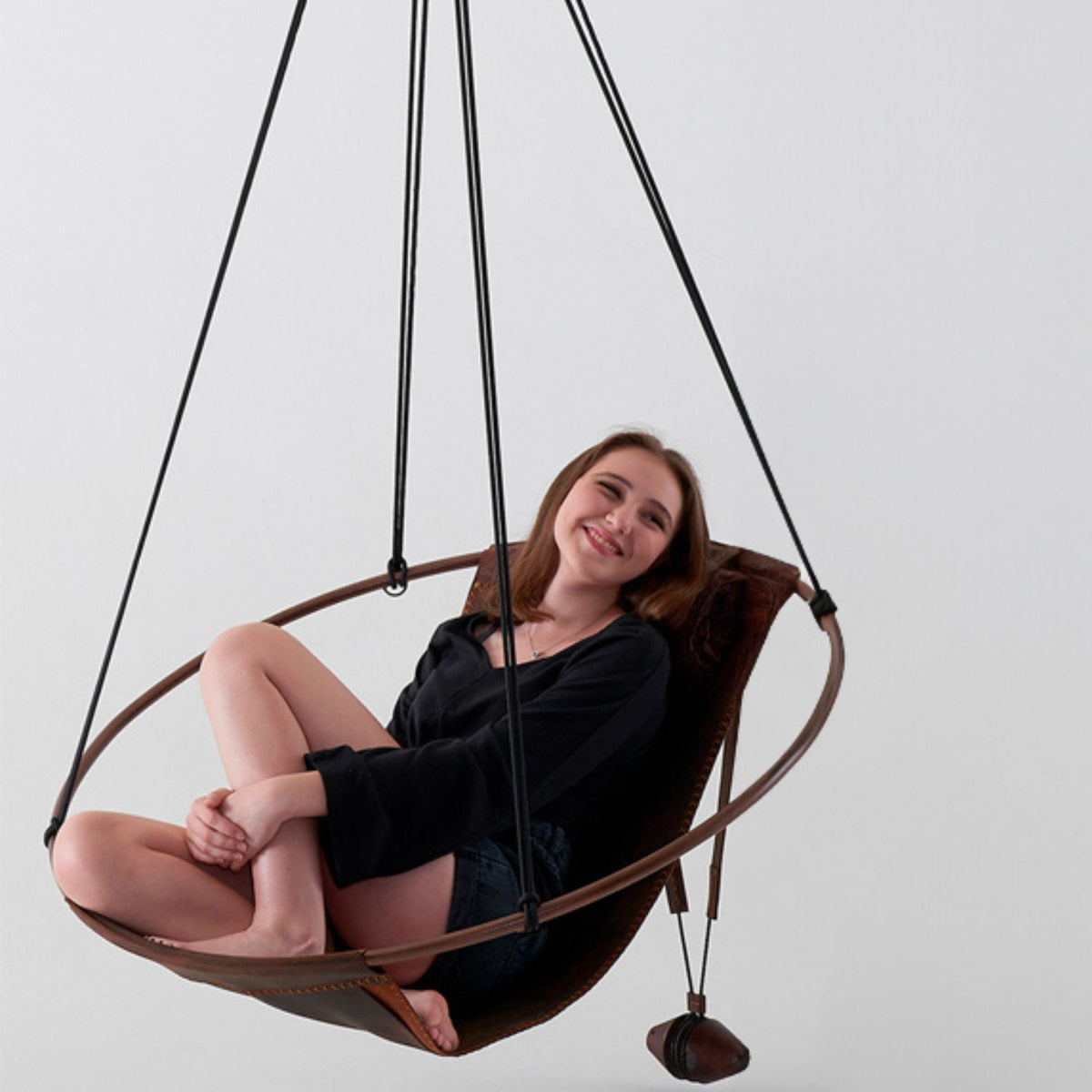 Sling_hanging_chair_oil_tan_leather_lifestyle.jpg