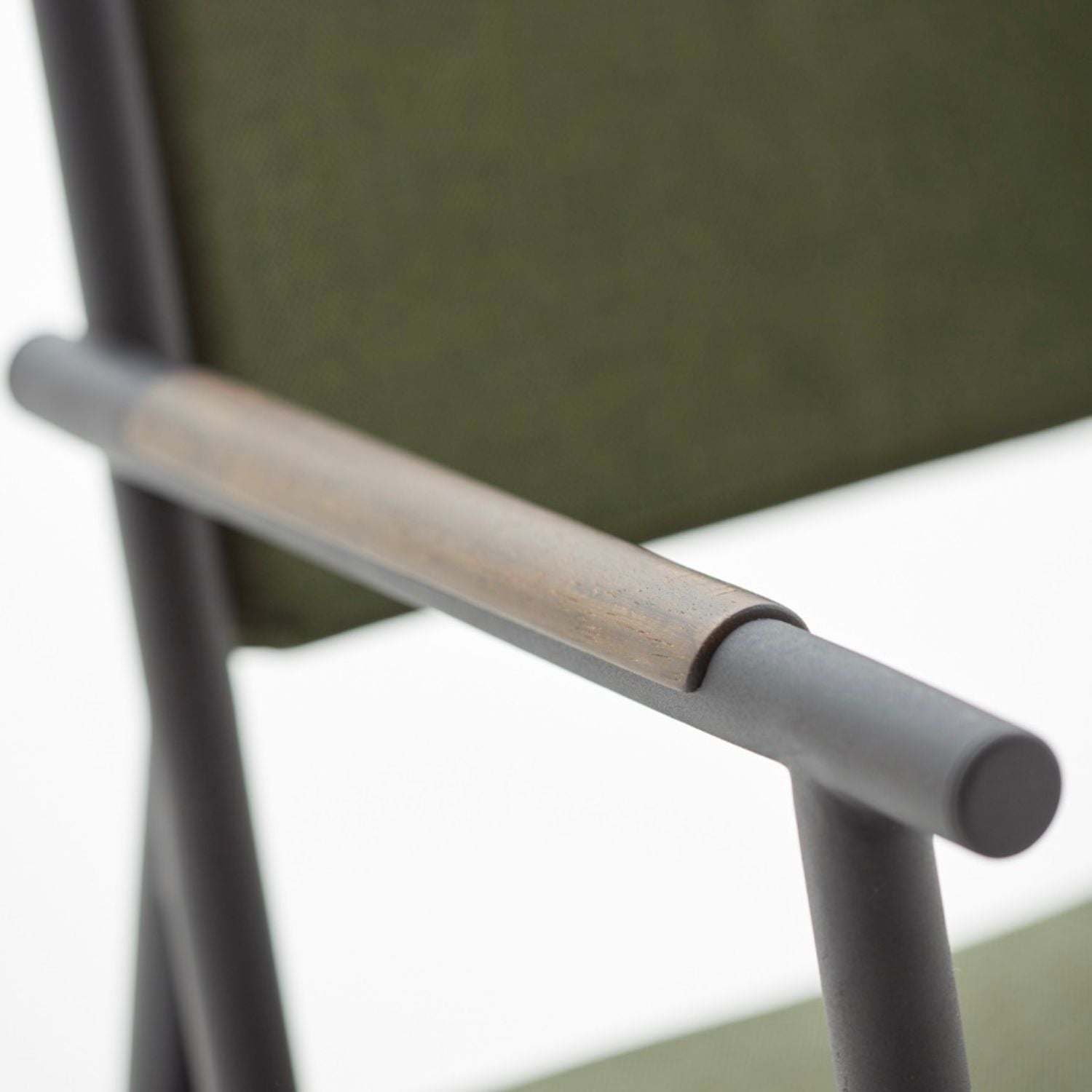 Slingshot dining chair with arms