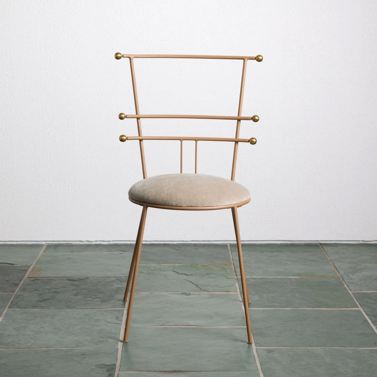 Sun_Singer_Chair_Rolled_beaten_brass_front.jpg