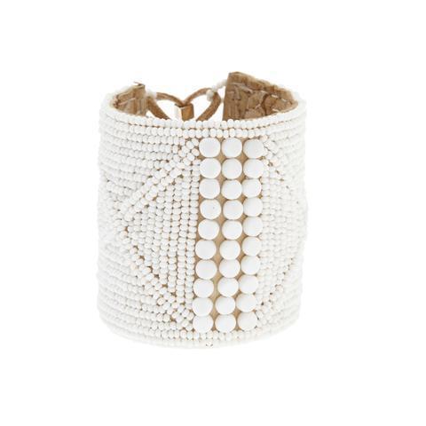 WIDE LEATHER CUFF -  JEWELRY BY SIDAI DESIGNS. An intricately beaded leather bracelet from our Sipolio collection. This collection shares the journey of boyhood to warriorhood of a young Maasai male, who wears black and adorns himself with white beaded jewelry and detailed face markings.