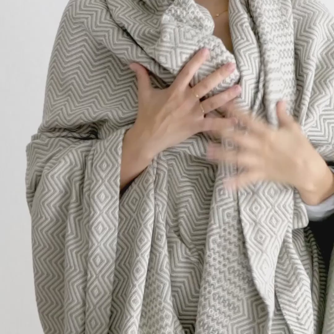 SMOKE BAKUBA THROW by Mungo Design. A bold and vibrant, yet elegant and sophisticated design. Perfect as a bed or couch throw. Made from 100% cotton grown in Swaziland. Designed & woven in South Africa. 
