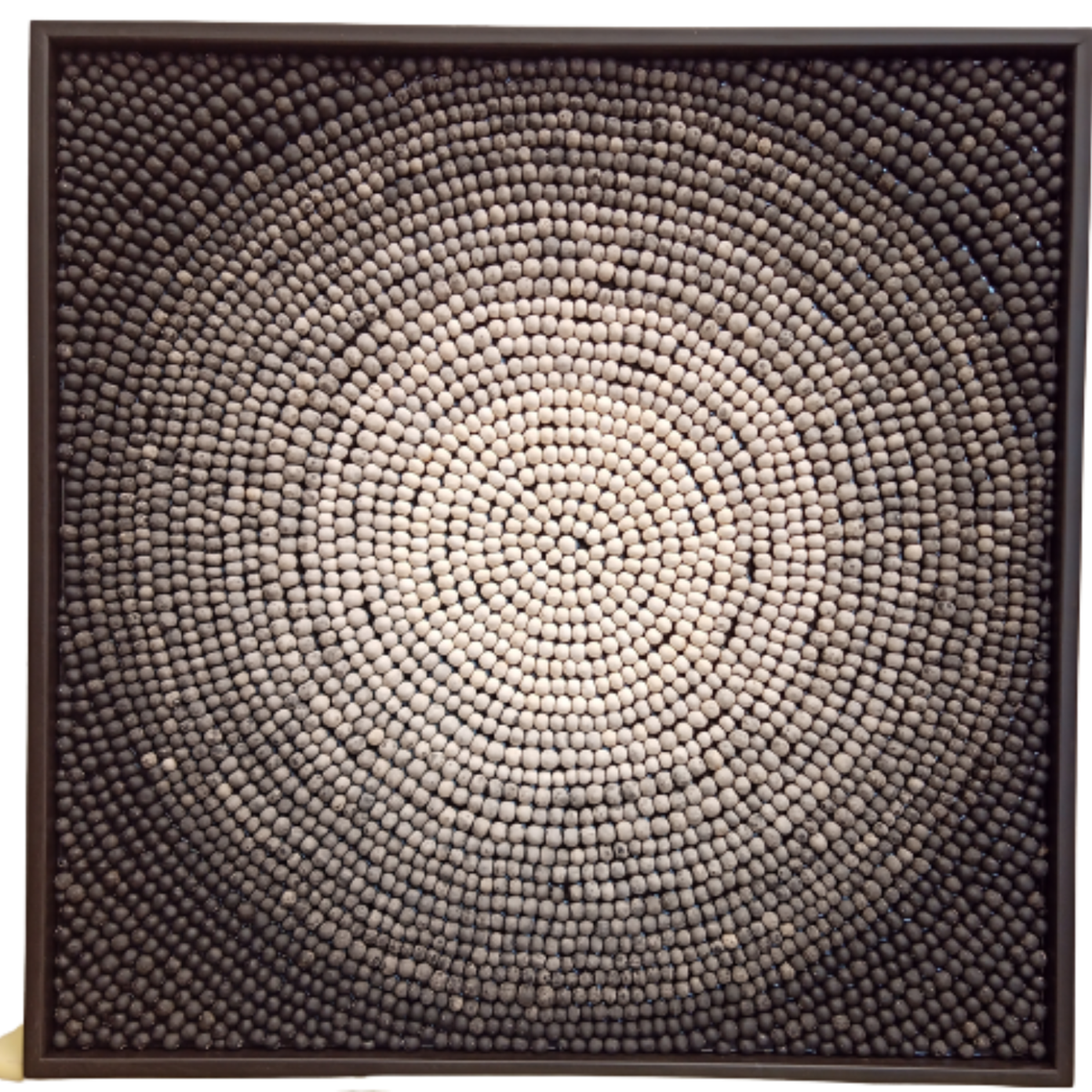 Spiral ombre clay bead artwork in black frame