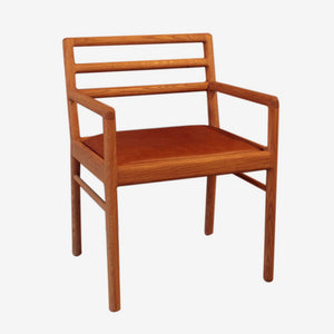 Ithambile chair with arm rests