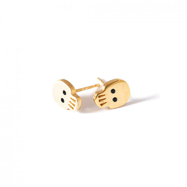 SKULL  EARRINGS - JEWELRY BY KIRSTEN GOSS. Miniature skull stud earrings, a delicate reminder of our mortality. Exciting mini studs to be mixed and matched. Beautifully handmade in 18kt gold vermeil. 
