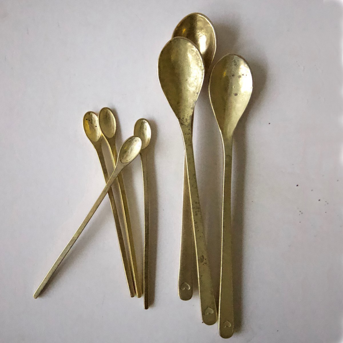 LARGE METAL SPOON by Love Milo Tableware. These brass plated metal spoons have a natural organic shape and are a lovely addition to any of the Love Milo ceramics range. Available at Sarza home décor & furniture store in Rye, New York. We specialize in contemporary African design.
