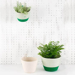 PLANTER BASKET IVORY BY MIA MELANGE. Add some greenery to your home with these unique planters. Available in three sizes. Made from 100% cotton rope which is sewn together in a coiling technique.