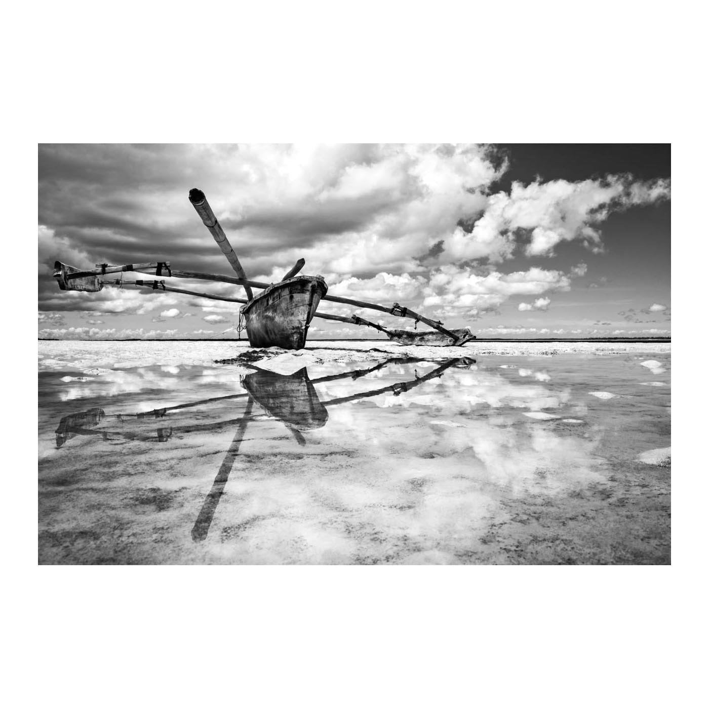 ZAN_21 BY DAVID BALLAM PHOTOGRAPHY. Outrigger, Michamvi, Zanzibar of Asante Sana Collection. A typical view of traditional outrigger boats, or Ngwalas, used by the Swahili people on the island of Zanzibar. 